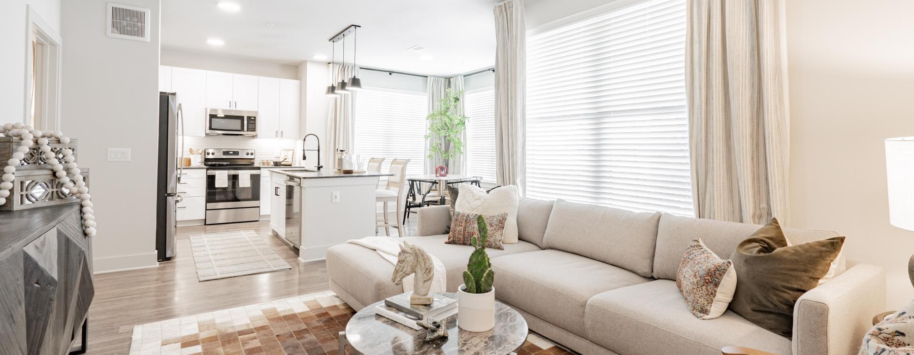 a living room with a couch and a table