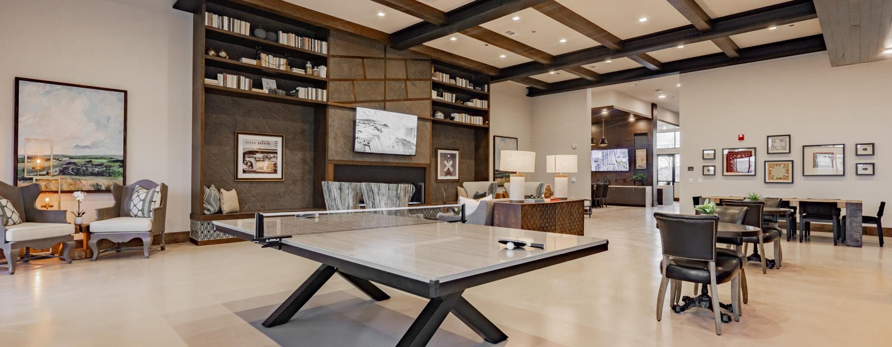 Beautiful clubroom with lounge seating and billiards